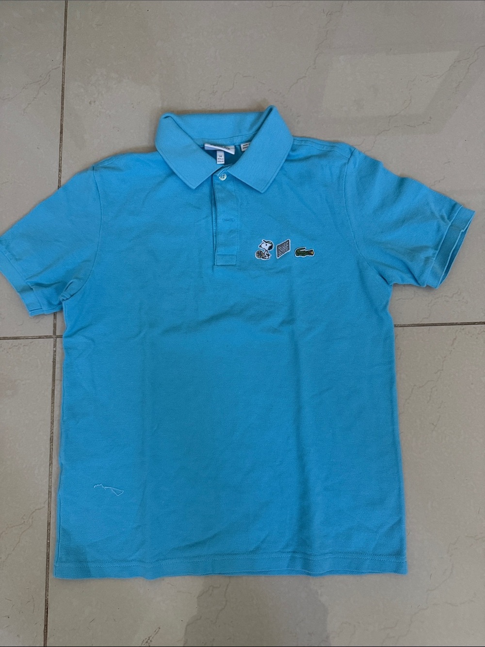Lacoste Peanuts Collab Turquoise Blue Polo with Embroidered Chest Motifs